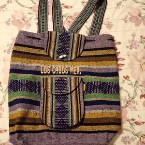 Vibrant Striped Backpack with 'Los Cabos' Text